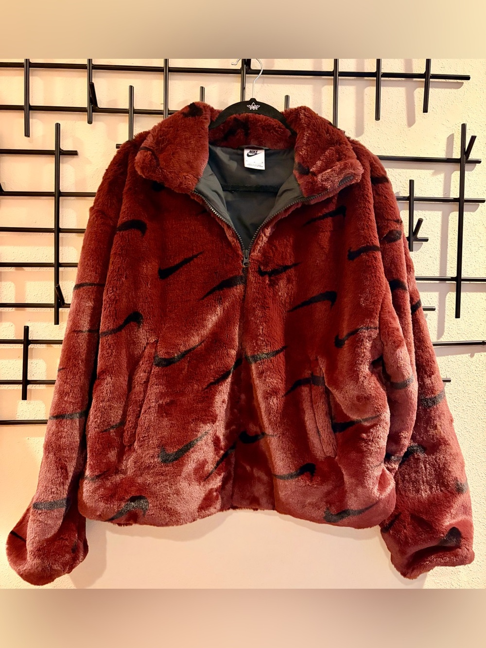 Nike Women’s Burgundy Plush Full-Zip Puffer Jacket with Black Swoosh Pattern